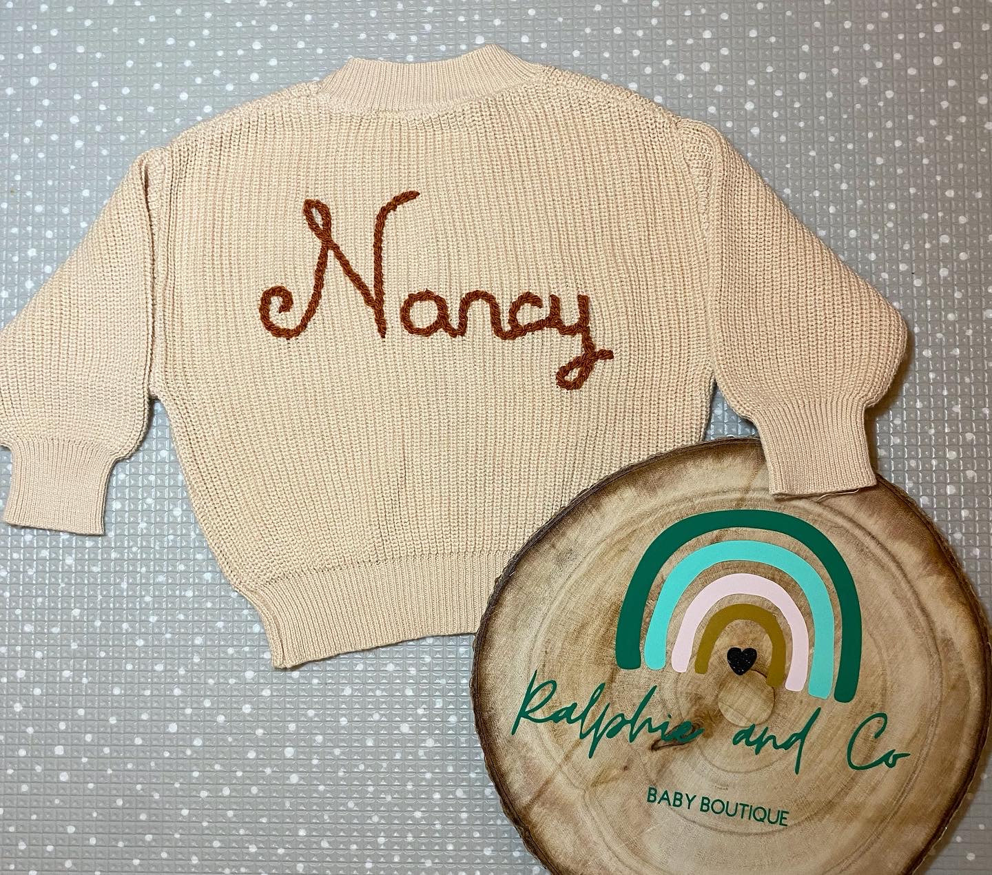 Beige knitted jumper