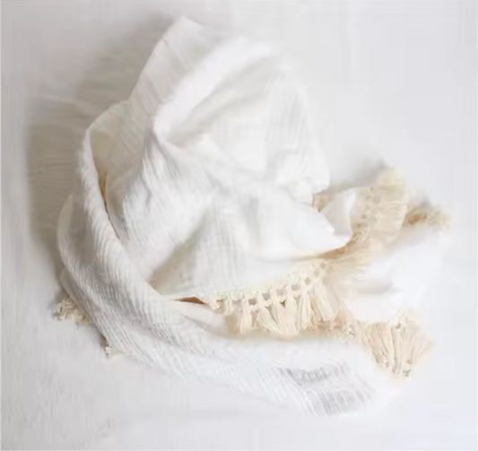 White tassel muslin blanket