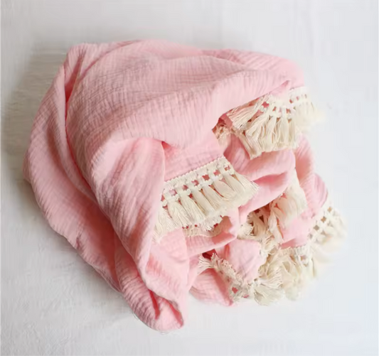 Pink tassel muslin blanket